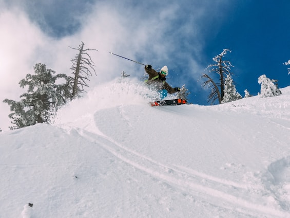 person skiing on snow-covered hill