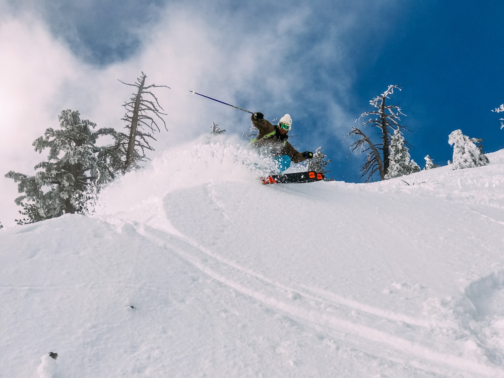 person skiing on snow-covered hill