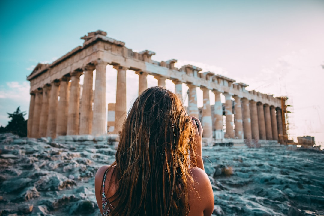 woman looking through the Athens,