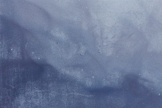 a black and white photo of a blue wall