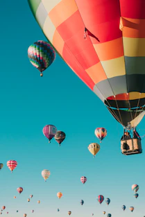 hot air balloons under blue sky
