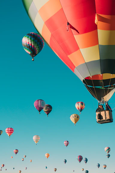 hot air balloons under blue sky