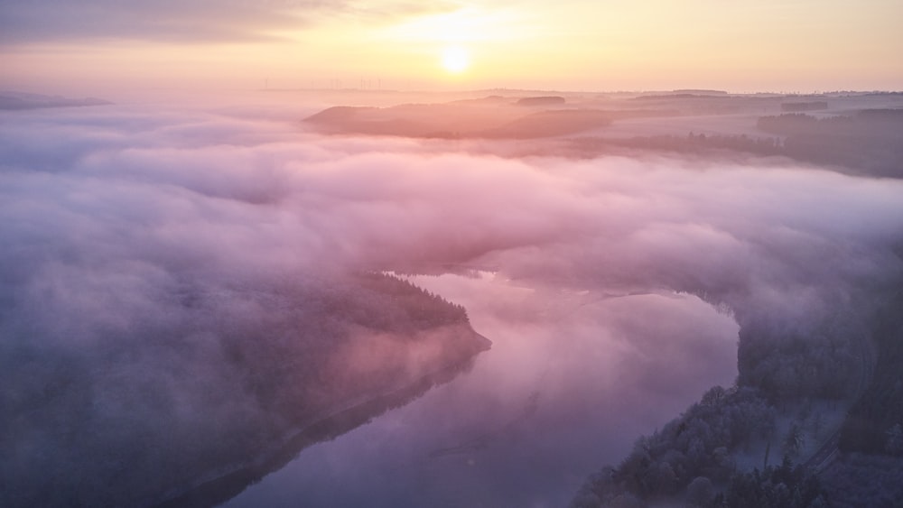 landscape photography of foggy river