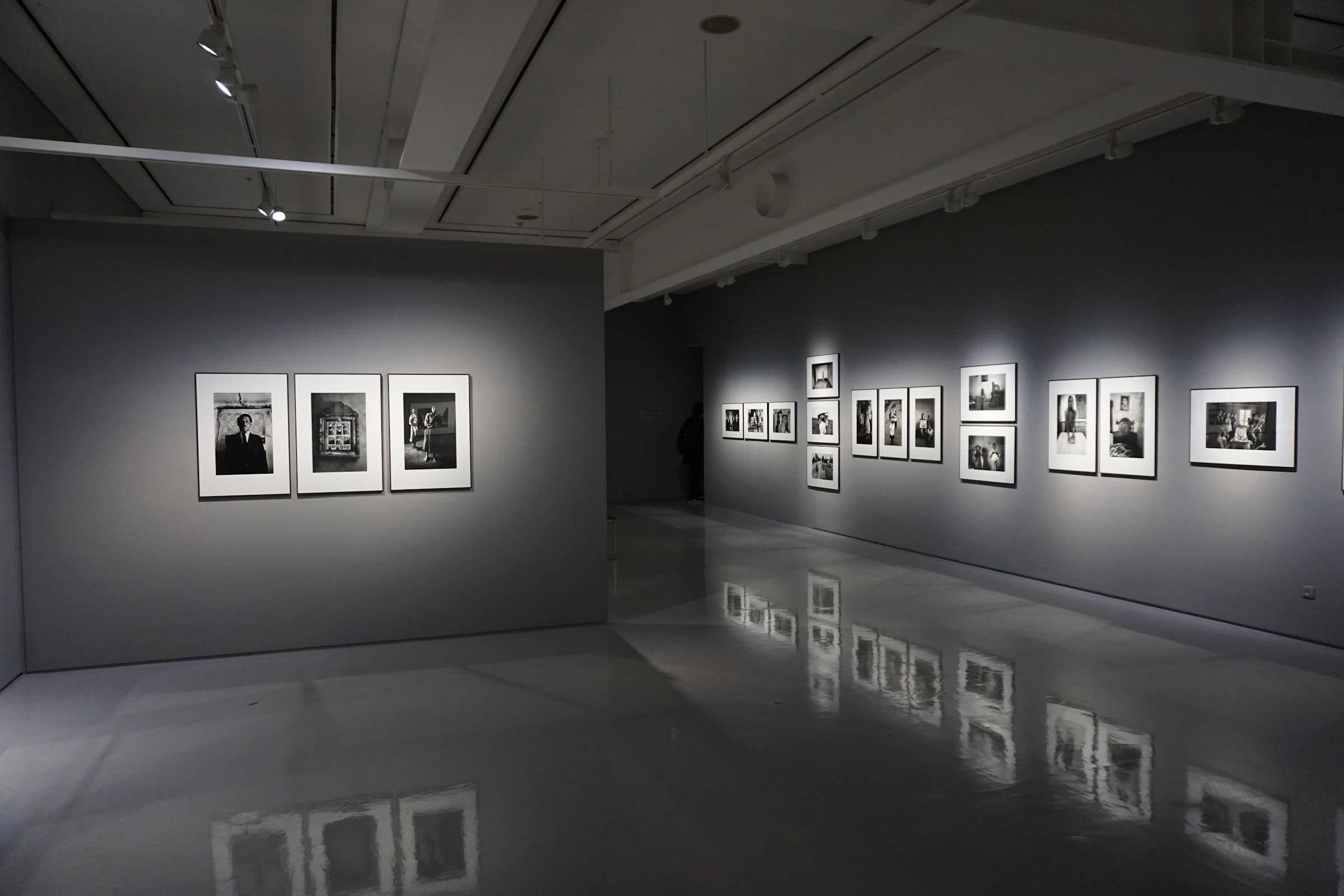 Framed contemporary artworks displayed in a Seoul gallery