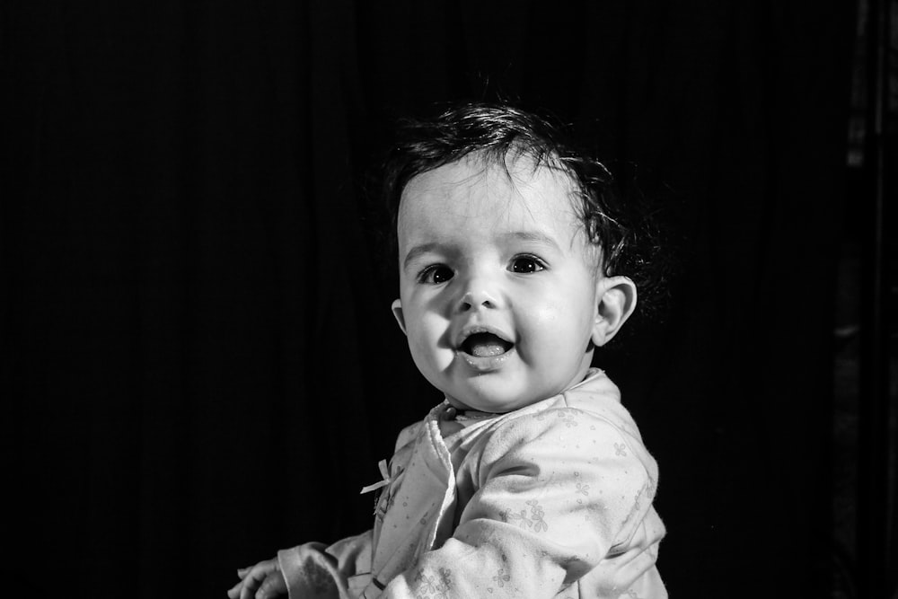 black and white photo of toddler