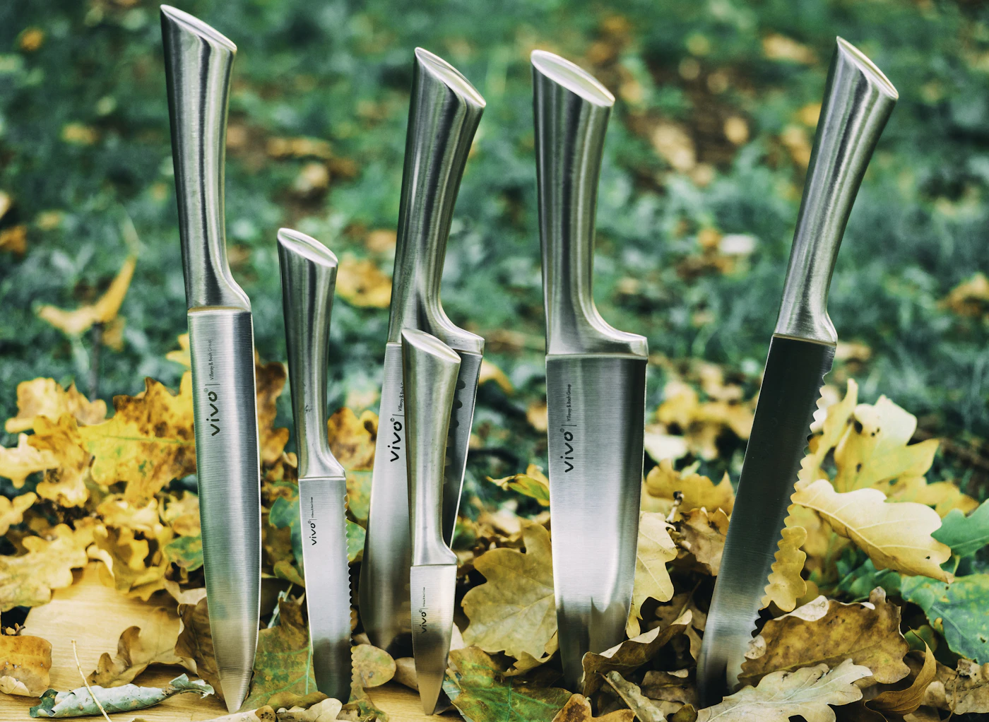 Premium stainless steel kitchen knives and cutlery sets displayed on a modern surface