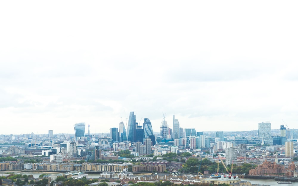 landscape photo of city under cloudy sky during daytime