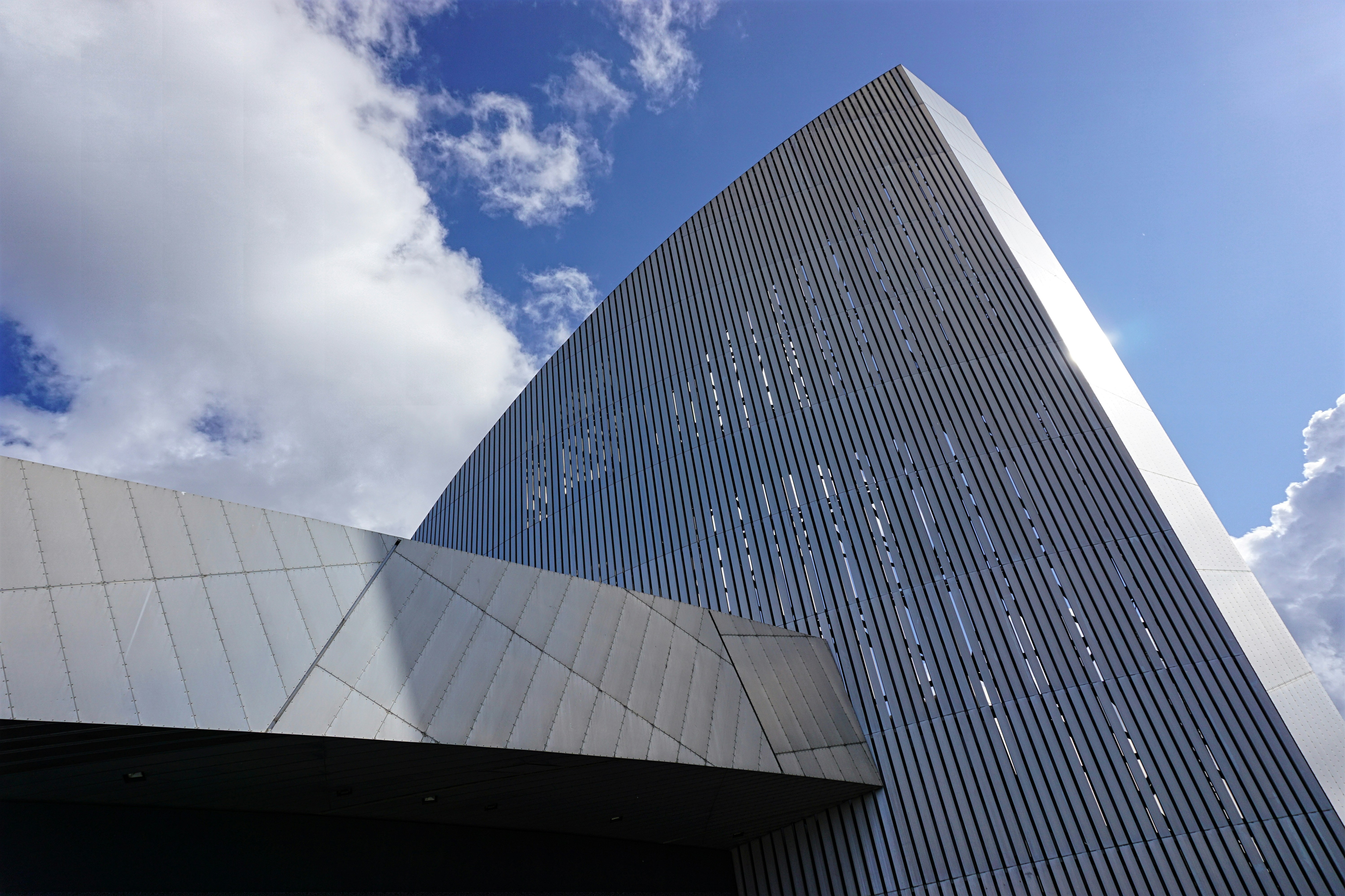 Large commercial steel storage building exterior, bright daylight