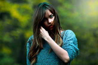 woman wearing blue sweater