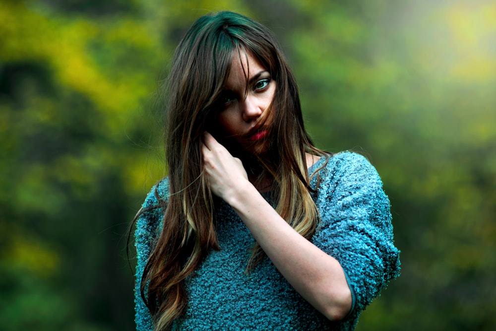 woman wearing blue sweater