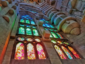 Close-up of colorful stained glass windows in a historic cathedral.