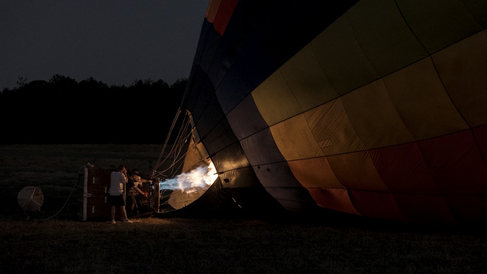 two men starting hot air balloon