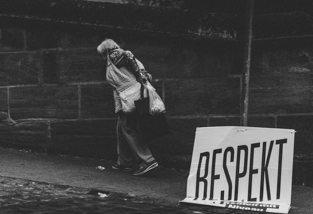 person walking on roadside