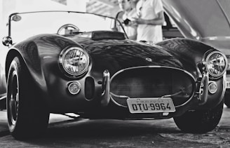 grayscale photography of sports coupe