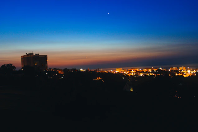 A sleek Atlanta skyline at dusk, symbolizing opportunity and growth in real estate and investment.