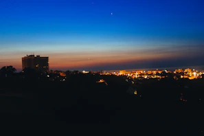 A city skyline seen at dusk, highlighting growth and opportunity.