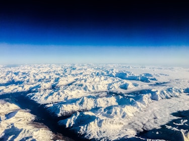 A breathtaking view of the Andes mountains covered in snow.