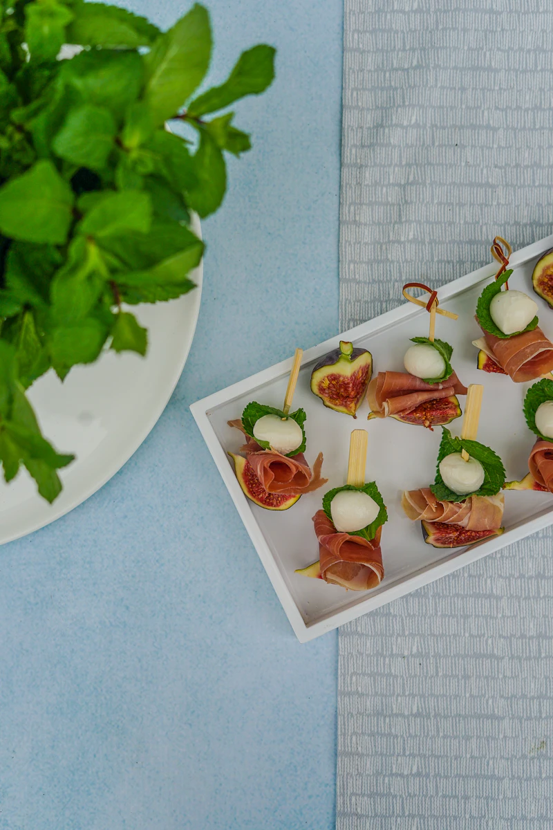 Small bites presented at a drinks reception.