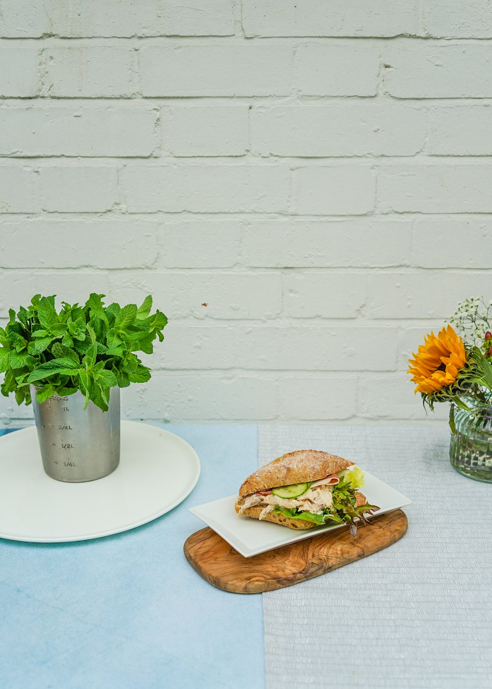 clubhouse sandwich on white ceramic plate