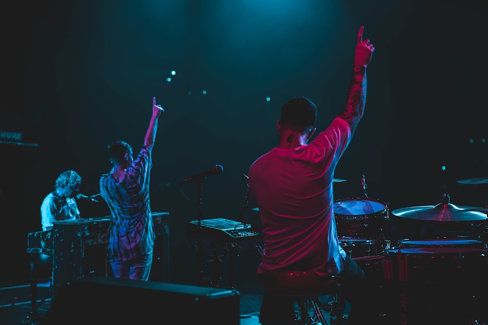 two person raising hands