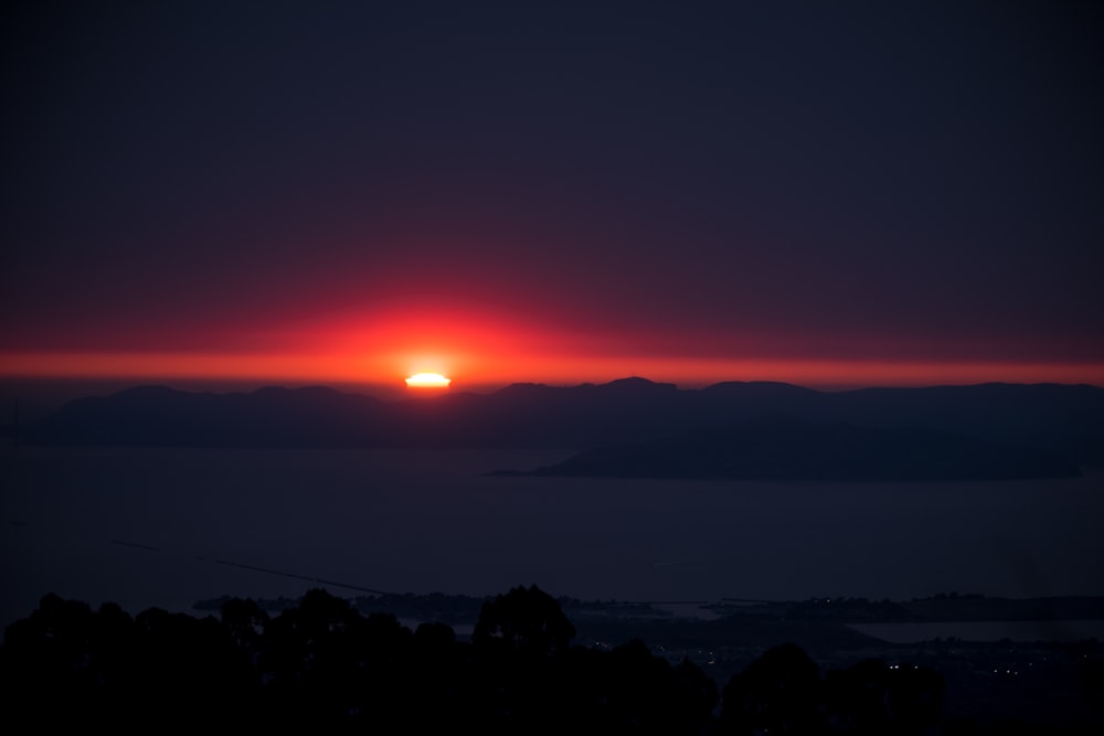 body of water during dawn