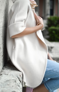 A cozy jacket draped over a gym bench, ready for post-workout wear.