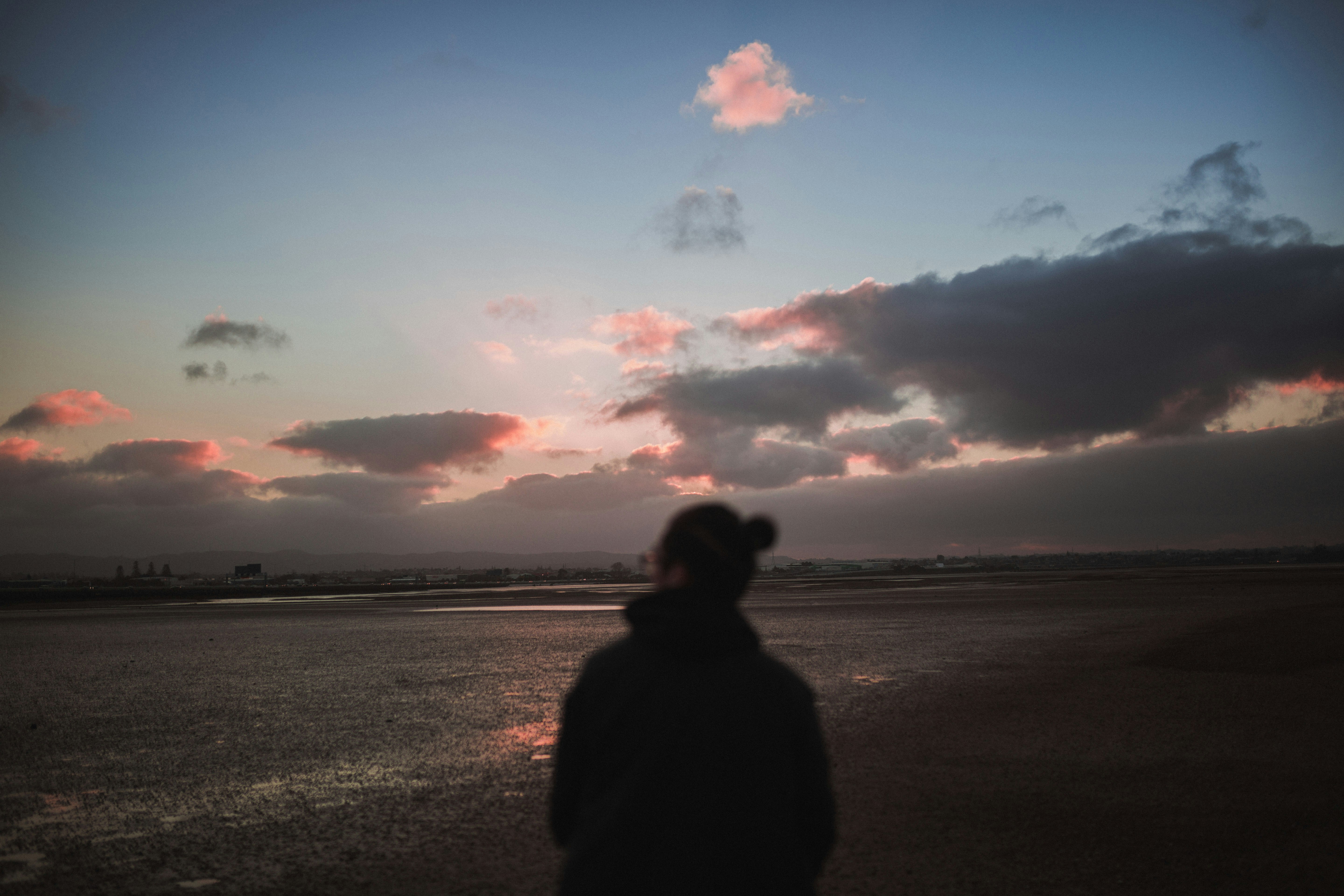 woman standing on sea shore