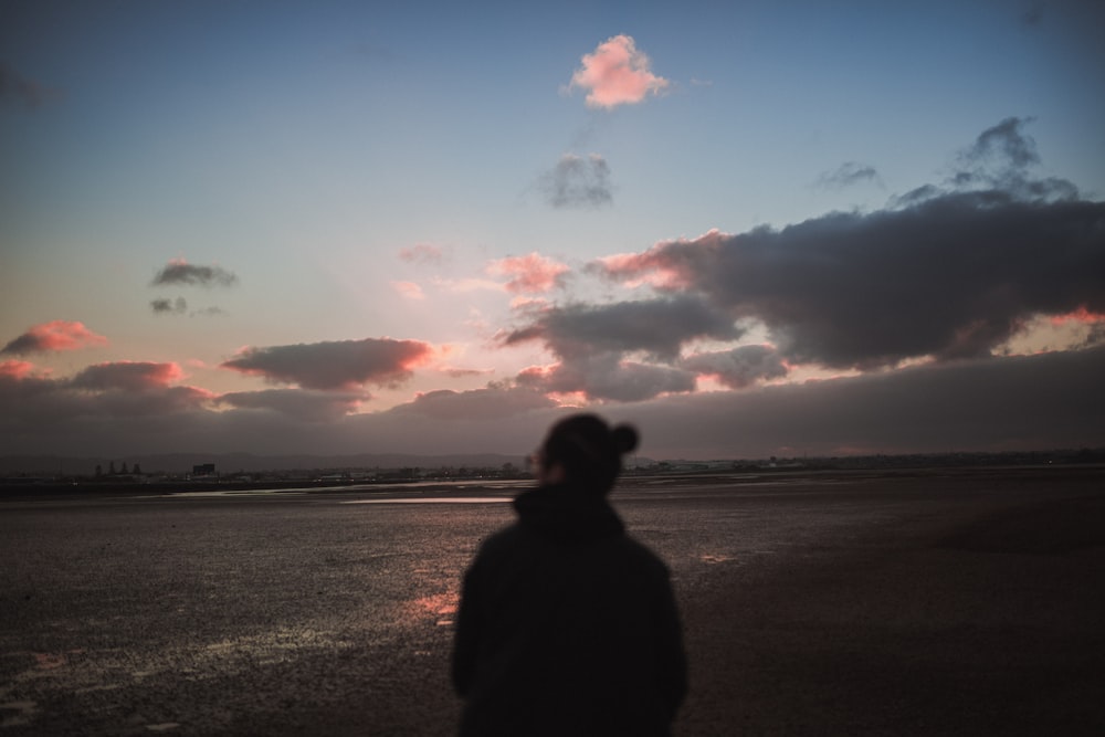 woman standing on sea shore