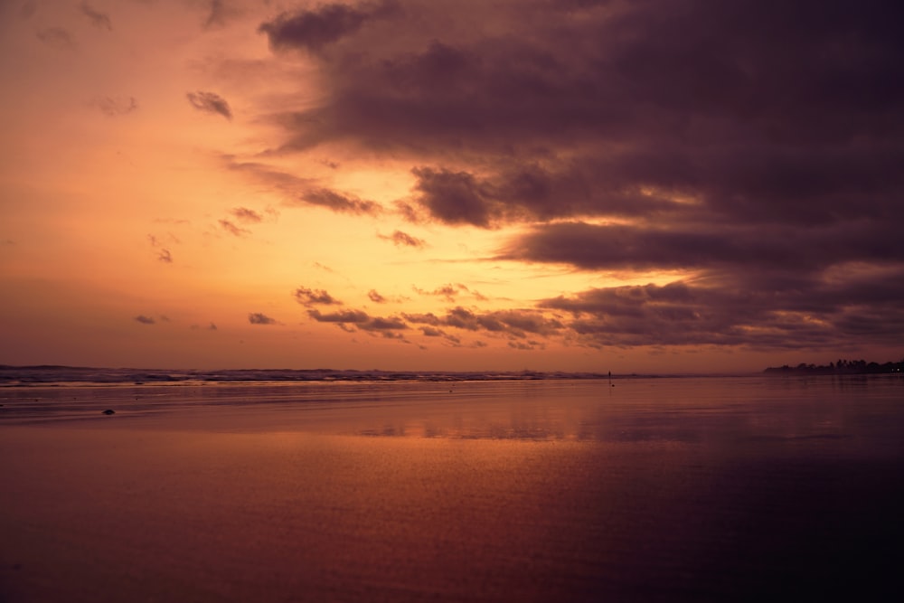 body of water during golden hour