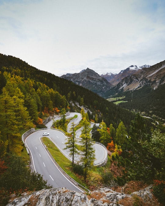 aerial view of zigzag road on mountain in Maloja Pass Switzerland