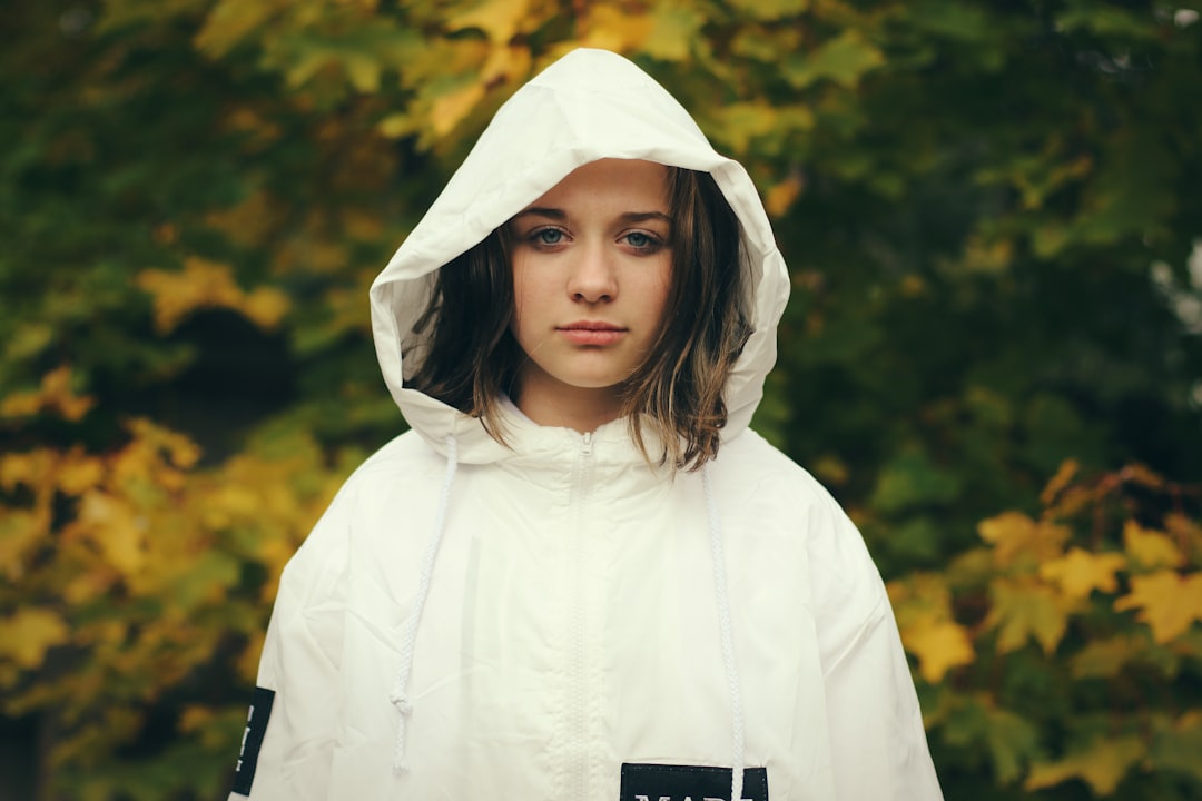 woman wearing white zip-up hoodie jacket