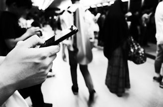 Monochrome image of a social media campaign in action on multiple devices.