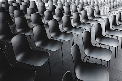 black chair lot audience google meet background