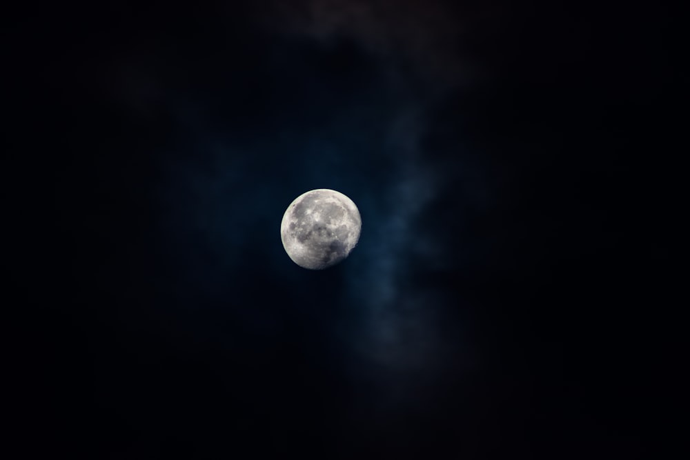 selective focus photography of full moon