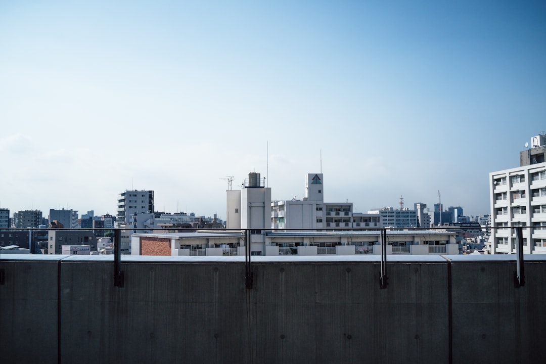 city buildings under blue sky,
