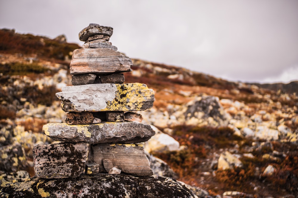 gray stacked rocks on a mountain