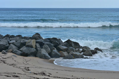 Close-up of a framed photo featuring a serene beach scene from Rosarito.