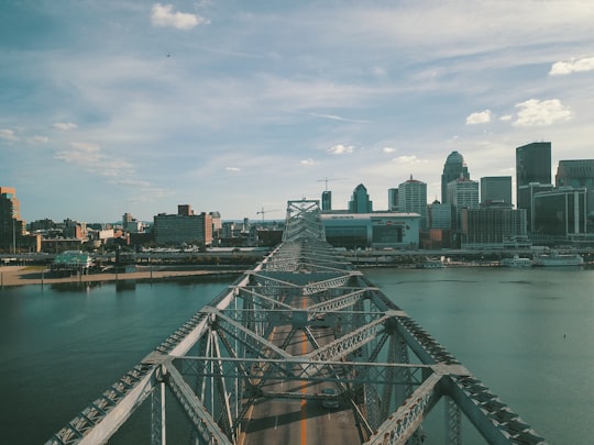 gray concrete bridge above body of water at daytime in Louisville United States