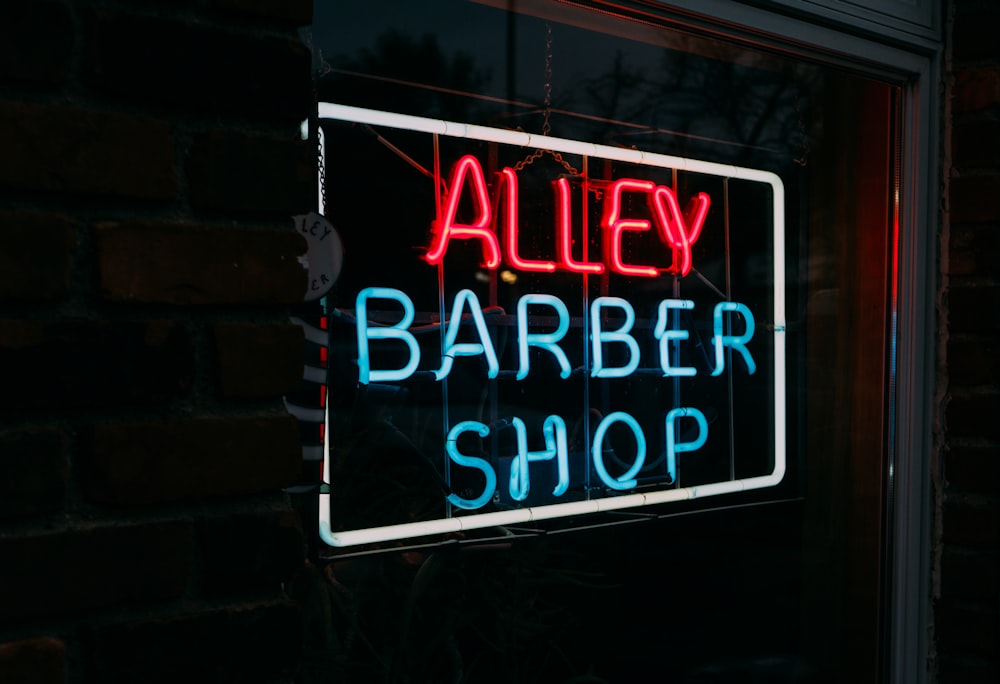 alley barber shop neon light signage