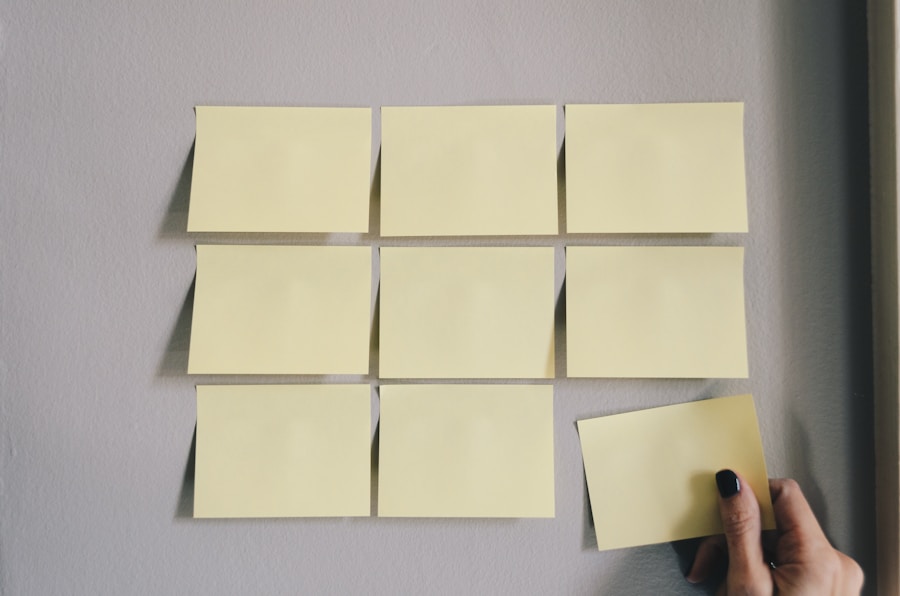 Organised paper notes and sticky markers on a desk