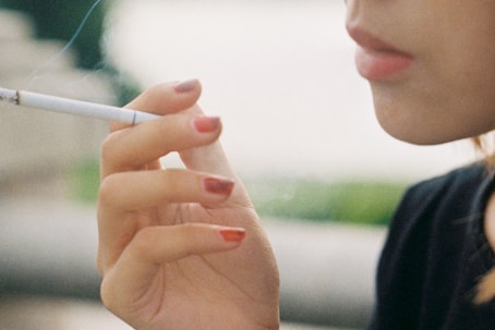 woman smoking cigarette