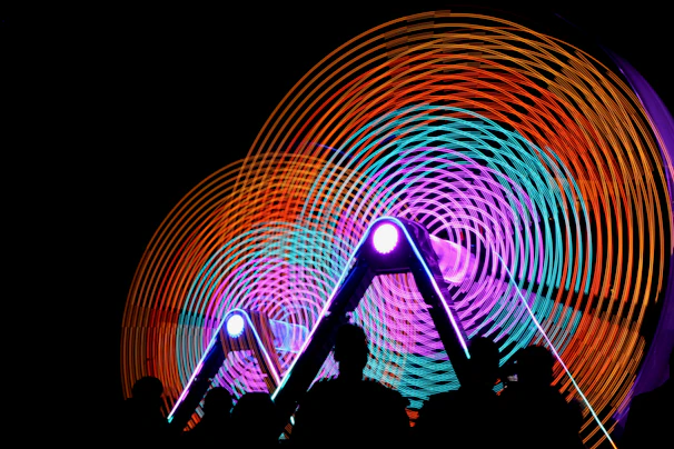 Close-up of a rotating visual stick displaying dynamic patterns in bright colors.