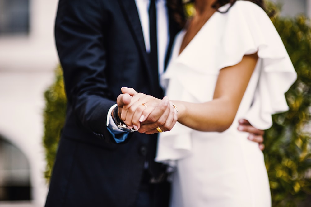 couple dancing during daytime