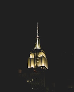 A striking night view of Burj Khalifa illuminated against a black sky.
