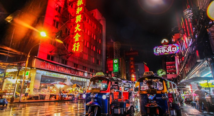 two auto rickshaw on the street