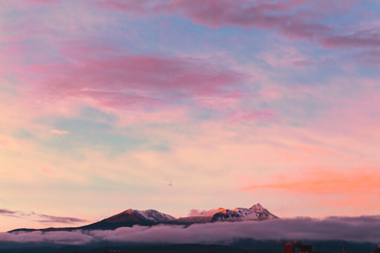 aerial photography of mountain under clouds during golden hour in Toluca Mexico