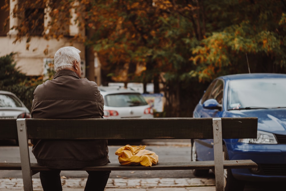 man sitting on bench