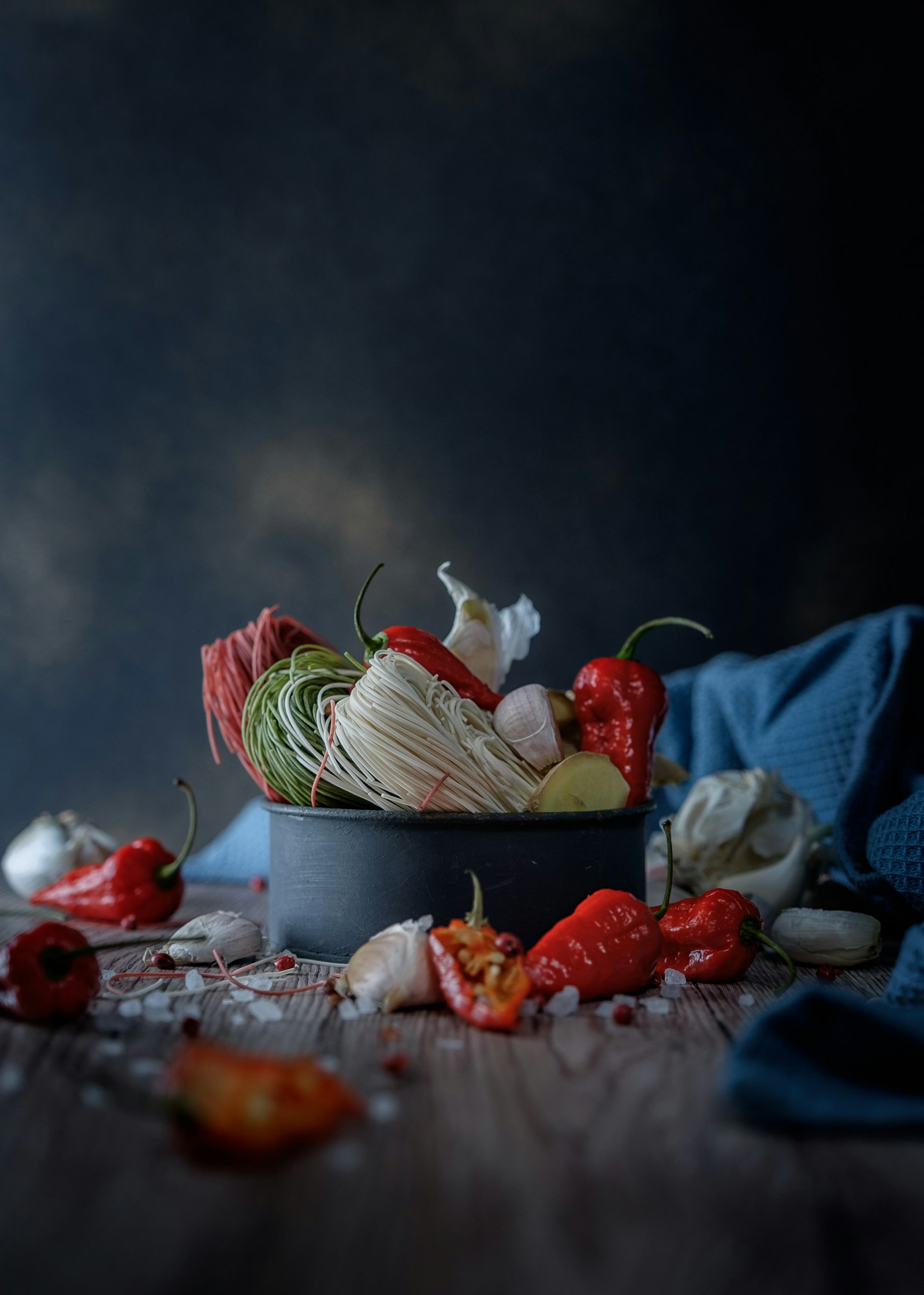 Fujifilm X-T10 + Fujifilm XF 16-55mm F2.8 R LM WR sample photo. Black cup surrounded by photography