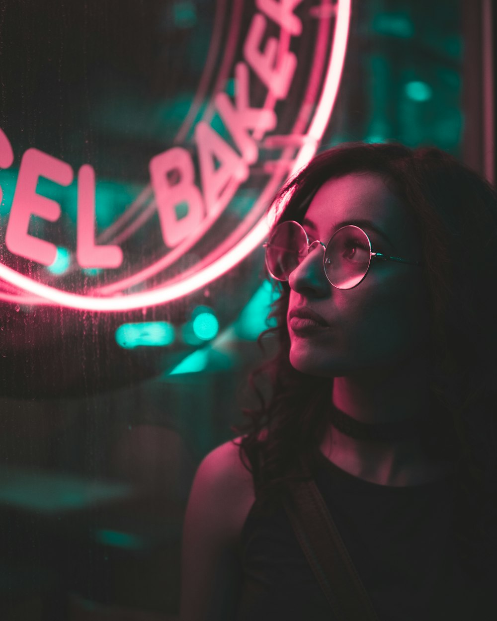 woman wearing eyeglasses with light effect photo