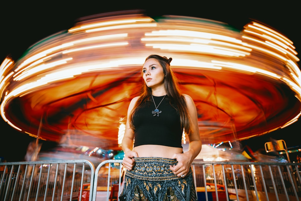 woman in front-of carousel